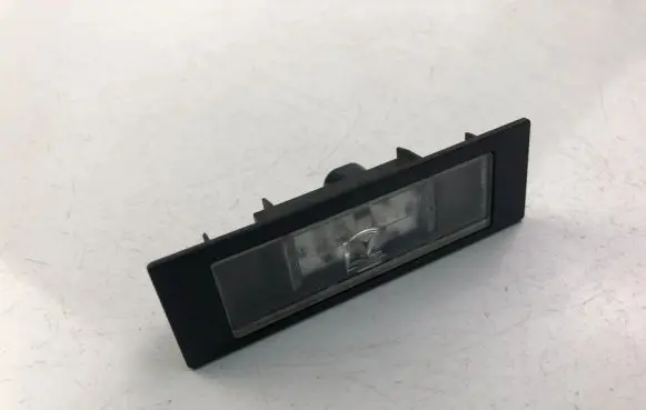 BMW 1 E81 E87 Trunk door license plate light bar 7193294