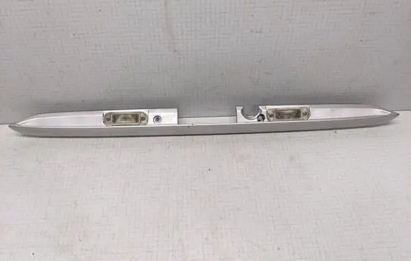 Mercedes-Benz E W210 Trunk door license plate light bar 2107400040