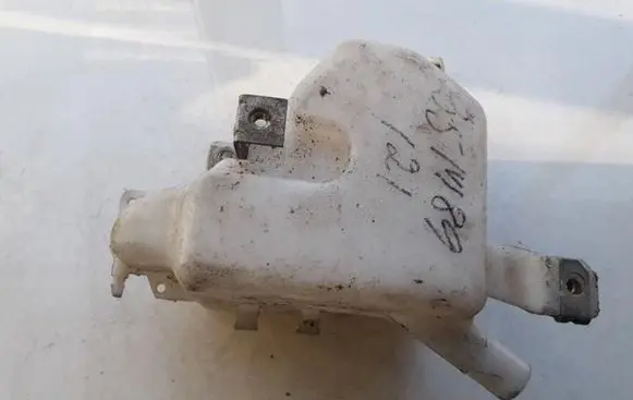 Mazda 121 Windshield washer fluid reservoir/tank