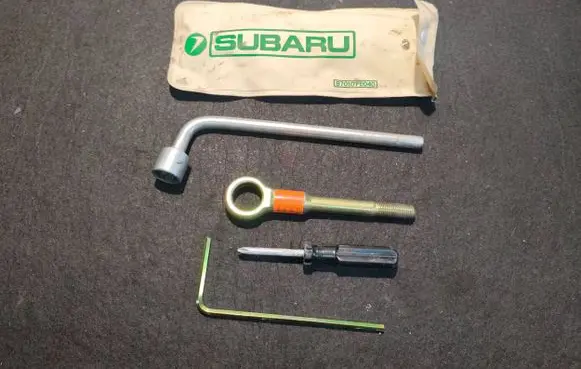 Subaru Outback Wheel nut wrench 97010FE040