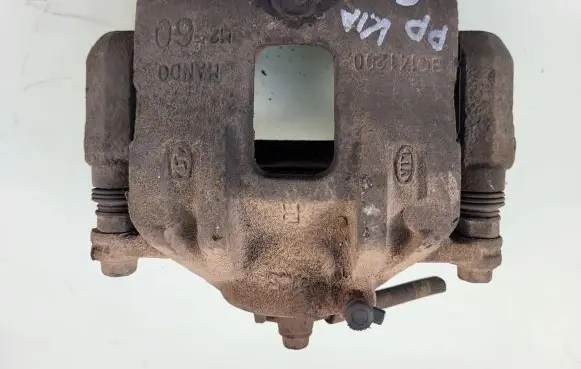 KIA Carens III Front brake caliper