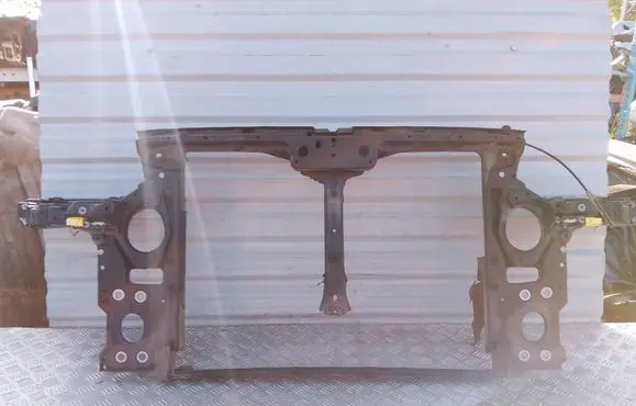 Top upper radiator support slam panel