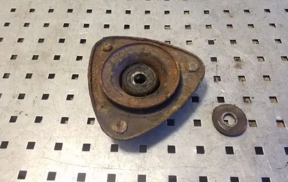 Subaru Outback Front upper strut mount 3F0120