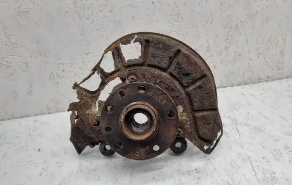 Front wheel hub spindle knuckle