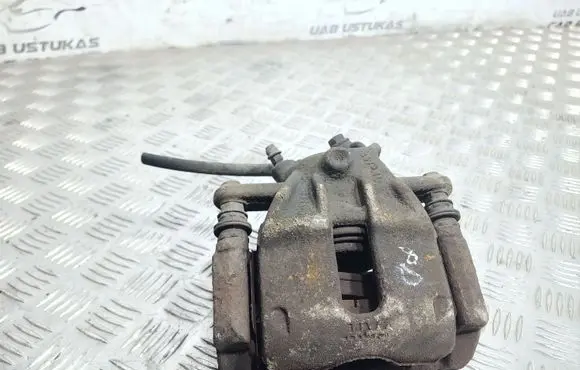 Nissan Note (E11) Front brake caliper