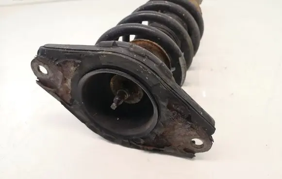 Nissan Primera Rear shock absorber with coil spring 56210AV700