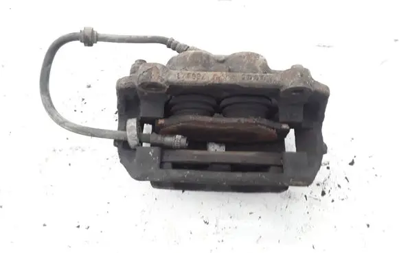 Opel Vivaro Front brake caliper 7701050919
