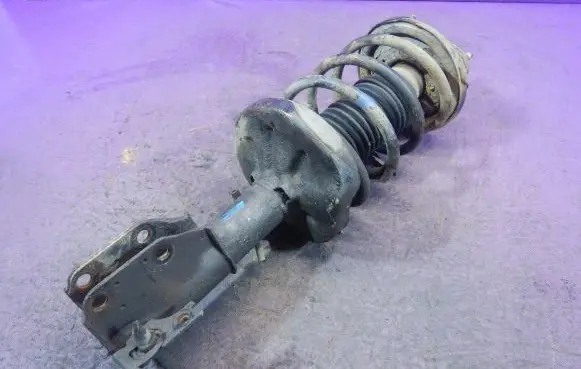 Mazda 323 Front shock absorber with coil spring