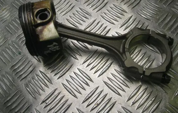 Piston with connecting rod