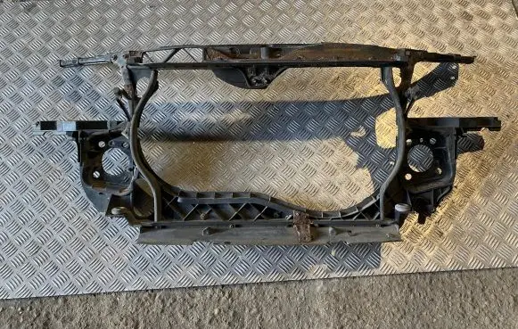 Radiator support slam panel