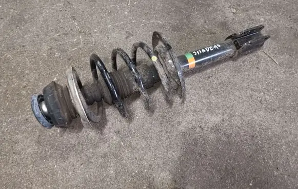 Dacia Sandero Front shock absorber with coil spring
