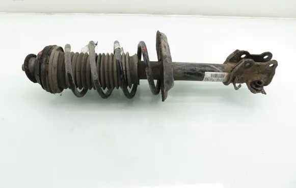 Opel Corsa D Front shock absorber with coil spring 