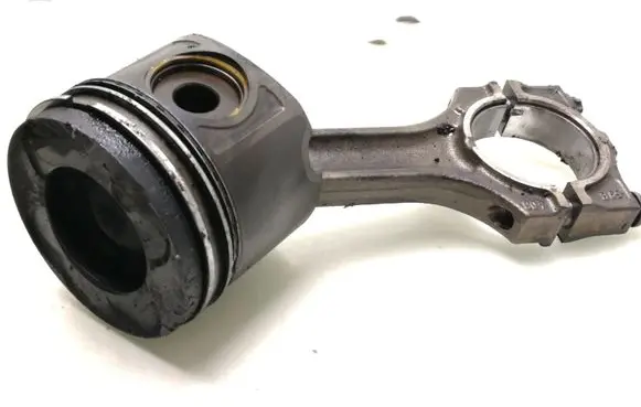 Piston with connecting rod