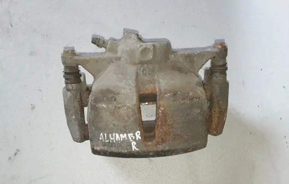 Seat Alhambra (Mk2) Front brake caliper 7N0615124