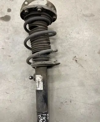 Front shock absorber with coil spring
