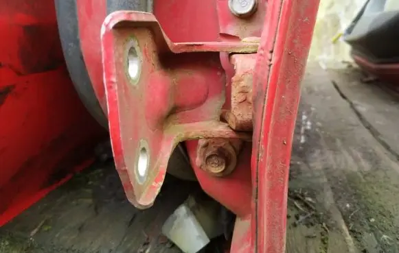 Mazda 323 F Rear door lower hinge