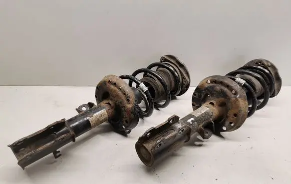 Front shock absorber with coil spring