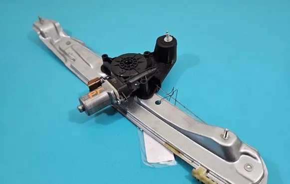Rear door window regulator with motor