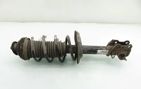 Opel Corsa D Front shock absorber with coil spring 