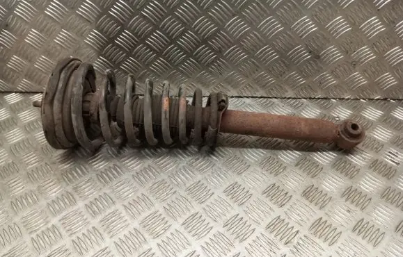 Nissan Primera Front shock absorber with coil spring