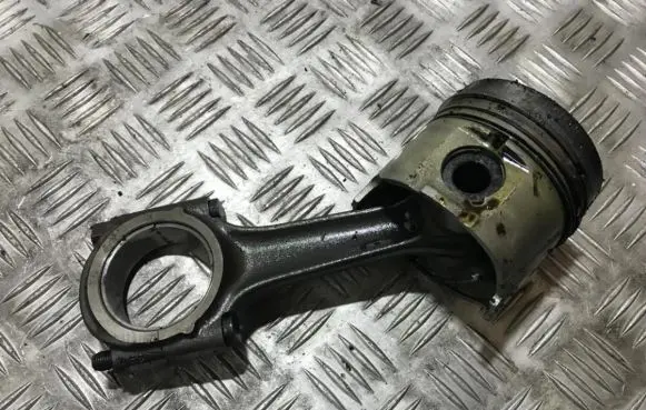 Piston with connecting rod