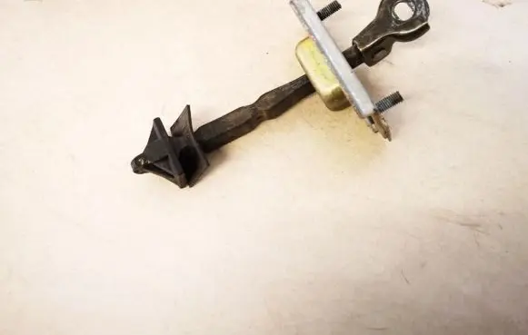Mazda Premacy Rear door check strap stopper