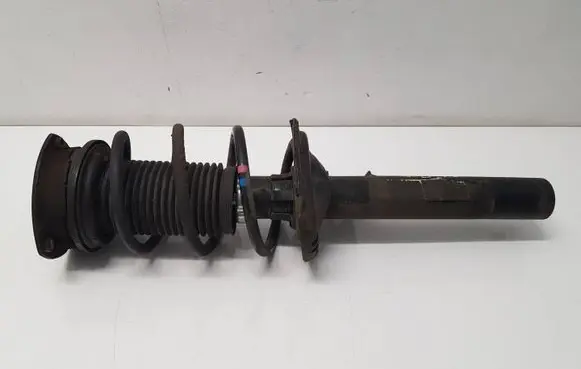 Volkswagen Golf VII Front shock absorber with coil spring