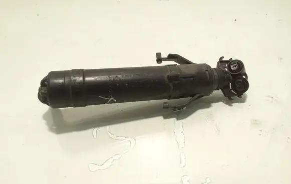 Volkswagen PASSAT B7 Headlight washer spray nozzle 3AA955103