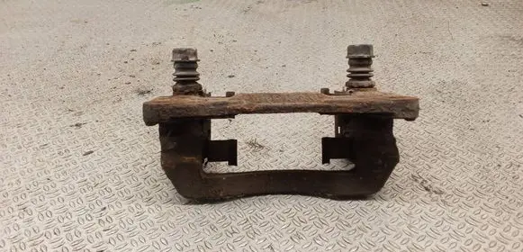 Subaru Legacy Brake caliper pad carrier rear 