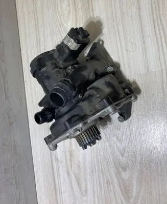 Thermostat/thermostat housing