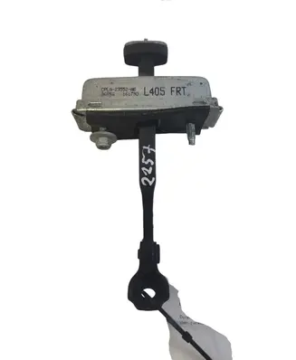 Front door check strap stopper