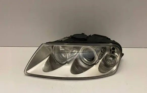 Volkswagen Touareg I Headlight/headlamp 7L6941015CE 89307871