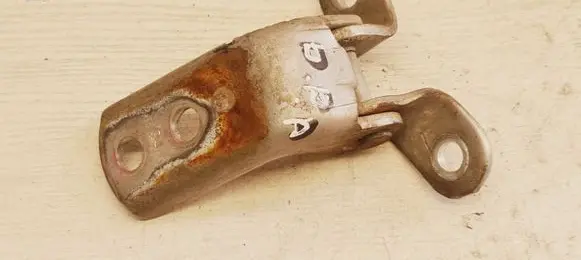 Front door lower hinge