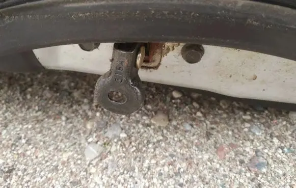Rear door check strap stopper