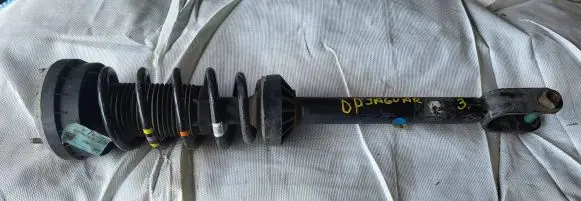 Jaguar XE Front shock absorber with coil spring GX7318B037FC