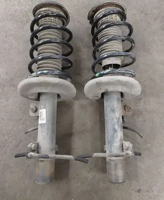 Peugeot 207 Front shock absorber with coil spring