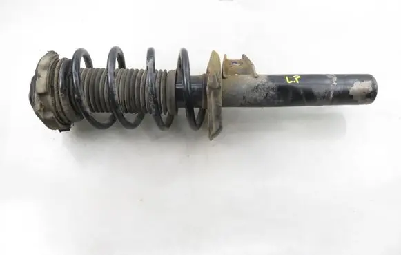 Volkswagen PASSAT B6 Front shock absorber with coil spring 335808