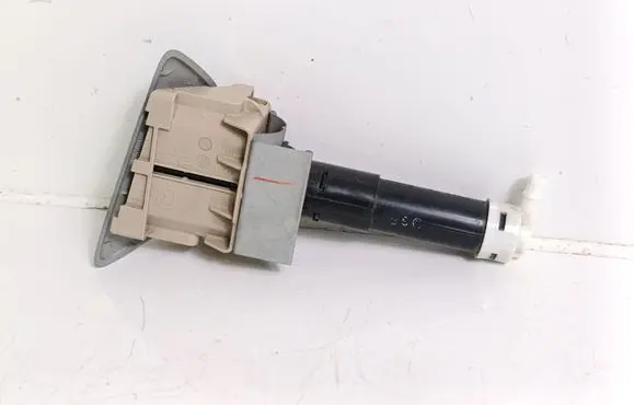 Headlight washer spray nozzle