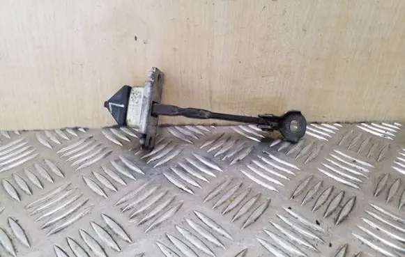 Mazda 3 I Rear door check strap stopper