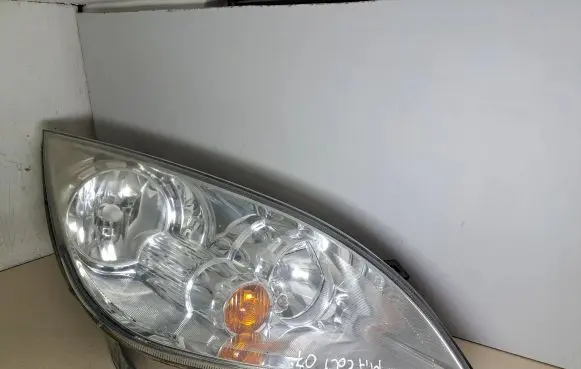 Mitsubishi Colt Headlight/headlamp MR957354 0301208202