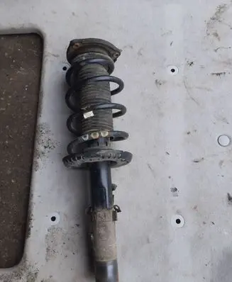 Volkswagen Fox Front shock absorber with coil spring