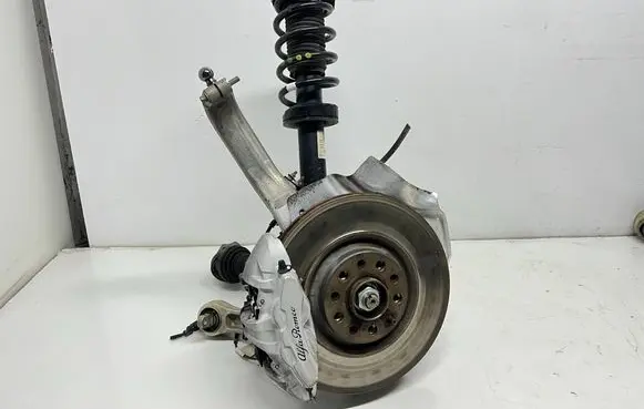 Front wheel hub spindle knuckle
