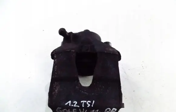 Volkswagen Golf VI Front brake caliper