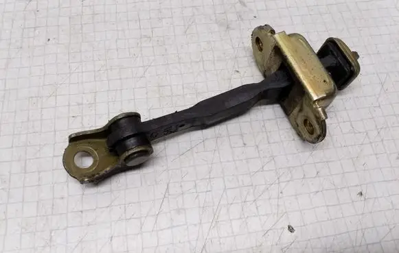 Nissan Almera N16 Front door check strap stopper