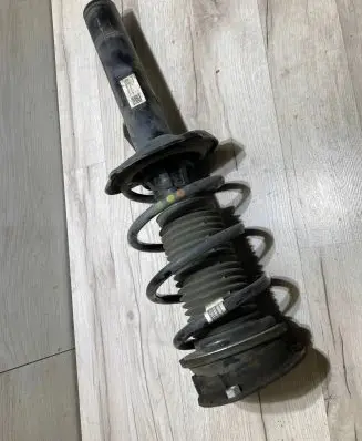 Audi Q2 - Front shock absorber with coil spring 5q0143031hj