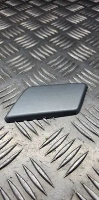 Headlight washer spray nozzle cap/cover