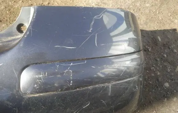 Rear bumper trim bar molding