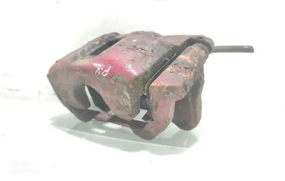Nissan Juke I F15 Front brake caliper