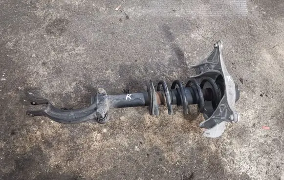 Front shock absorber with coil spring