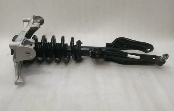 Tesla Model 3 Front shock absorber with coil spring 104436800F